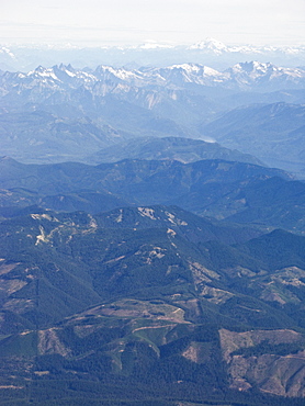 Views of the approach to Seattle, Washington area from a commercial airline, USA. Pacific Ocean.