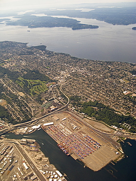 Views of the approach to Seattle, Washington area from a commercial airline, USA. Pacific Ocean.