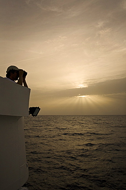 Sunrise or sunset at sea in the Atlantic Ocean from onboard the National Geographic Endeavour crossing the Atlantic Ocean from Lisbon, Portugal to Salvador, Brazil.