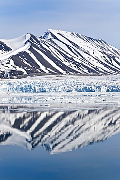 Approaching Monaco Glacier, in Liefdefjord near the northwest corner of Spitsbergen in the Svalbard Archipelago of Norway. 