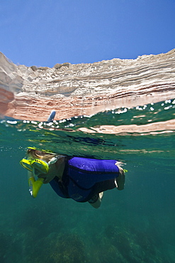 A snorkeler at Punta Colorado on Isla San Jose in the Gulf of California (Sea of Cortez), Baja California Sur, Mexico