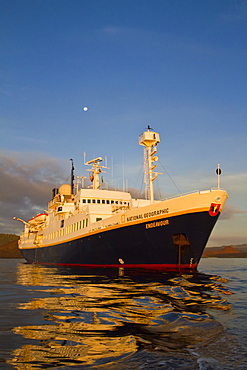 The Lindblad Expedition ship National Geographic Endeavour at sunrise operating in the Galapagos Islands, Ecuador