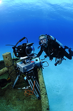 Neil Lucas with underwater time lapse system on the wreck of the 'Blue Plunder'. Bahamas.