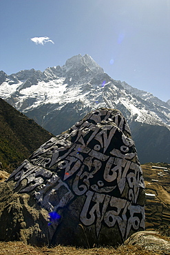 Everest Trail Scenic. Mountains, Prayer Flags, Stone prayer carvings.